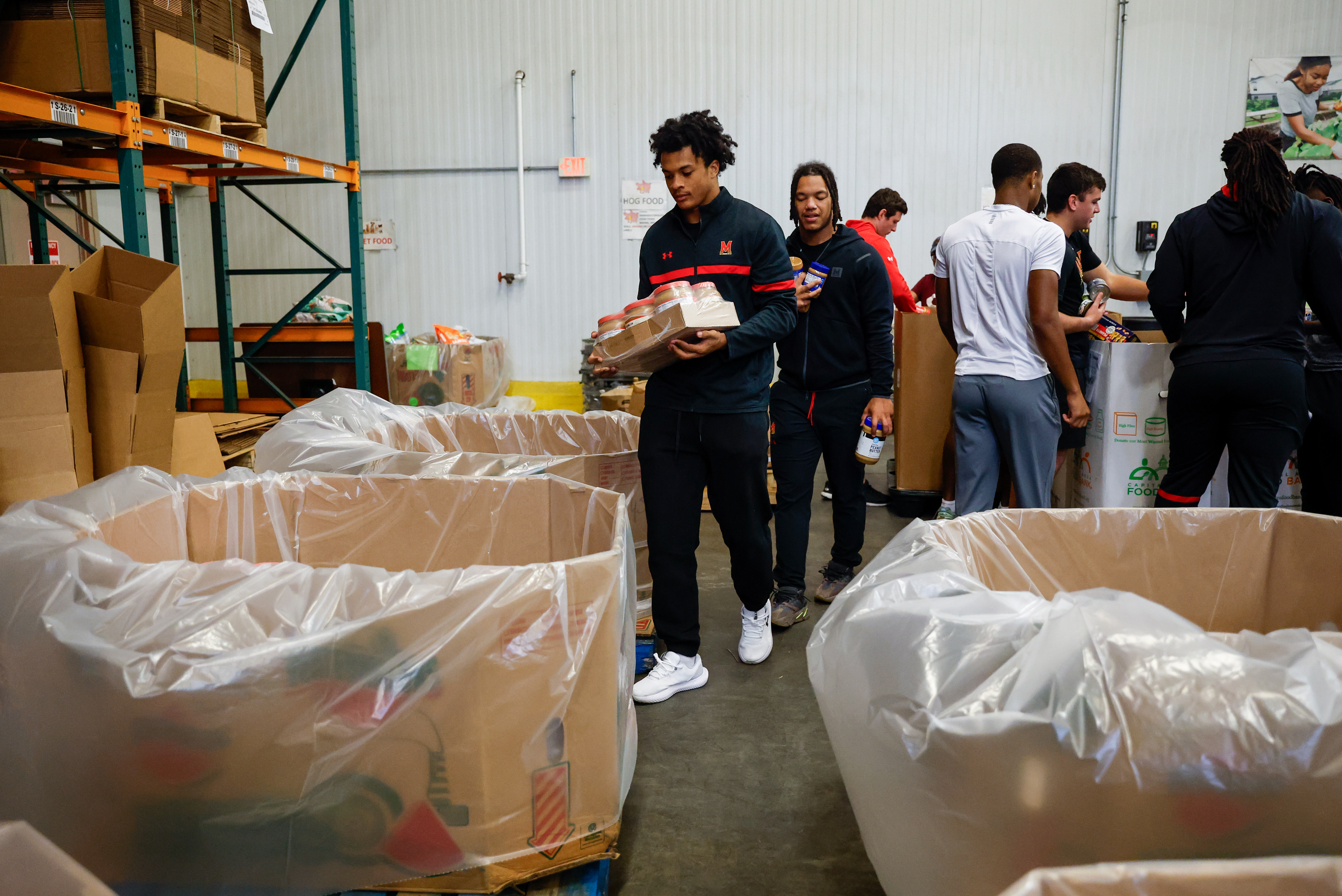 Maryland Football & Women's Basketball Food Bank NIL Event at Capital Area Food Bank in Washington DC,  on Friday, Oct. 4, 2024. Ashley Ray/Maryland Terrapins